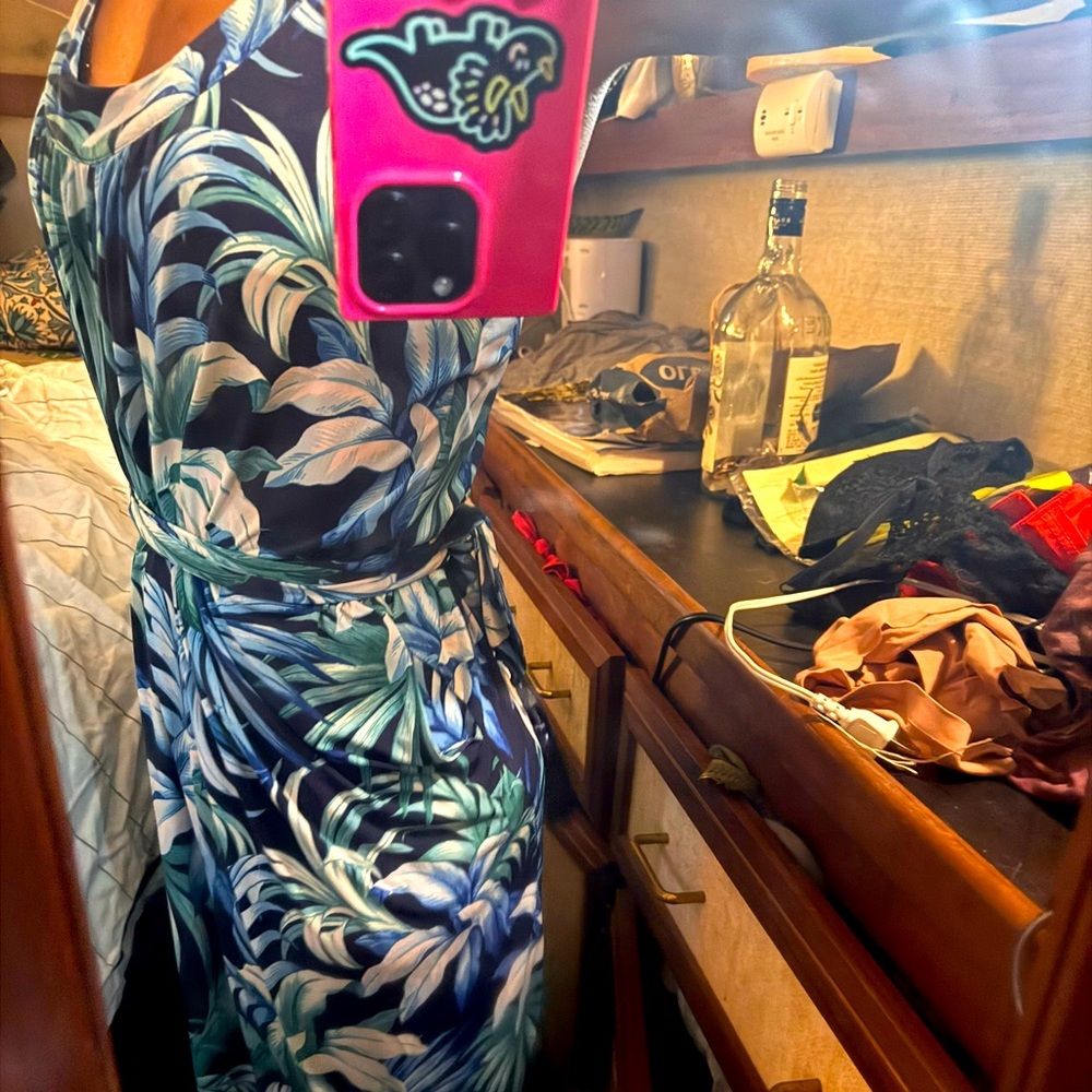 Tommy bahama Dress with pockets says XS but probably fits more like a S/M.